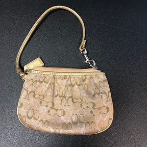 Coach wristlet gold and silver like new